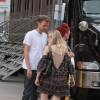 Dakota Fanning et son compagnon Jamie Strachan se promènent dans le quartier de Soho à New York le 27 juillet 2015.
