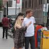 Dakota Fanning et son compagnon Jamie Strachan se promènent dans le quartier de Soho à New York le 27 juillet 2015.