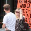 Dakota Fanning et Jamie Strachan dans le quartier de Soho à New York le 27 juillet 2015.