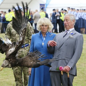 Le prince Charles et la duchesse Camilla en visite au salon floral de Sandringham le 29 juillet 2015