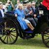Le prince Charles et la duchesse Camilla en visite au salon floral de Sandringham le 29 juillet 2015