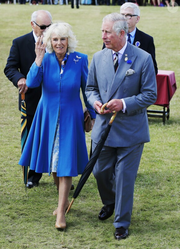 Le prince Charles et la duchesse Camilla en visite au salon floral de Sandringham le 29 juillet 2015