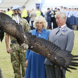 Le prince Charles et la duchesse Camilla en visite au salon floral de Sandringham le 29 juillet 2015