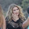 Gigi Hadid sur le tournage du clip de "How deep is your love" de Calvin Harris sur une plage de Malibu. Los Angeles, le 25 juin 2015.