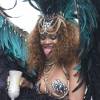 Rihanna, ultrasexy dans son costume inspirée de Jennifer Lawrence dans le film Hunger Games : Mockingjay, participe à la parade du Grand Kadooment lors du Crop Over Festival. Bridgetown (capitale de la Barbade), le 3 août 2015.