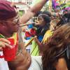 Lewis Hamilton, cigare en bouche, s'éclate lors du Grand Kadooment au Crop Over Festival à la Barbade. Le champion de F1 était sur le même char que Rihanna. Photo publiée le 5 juillet 2015.