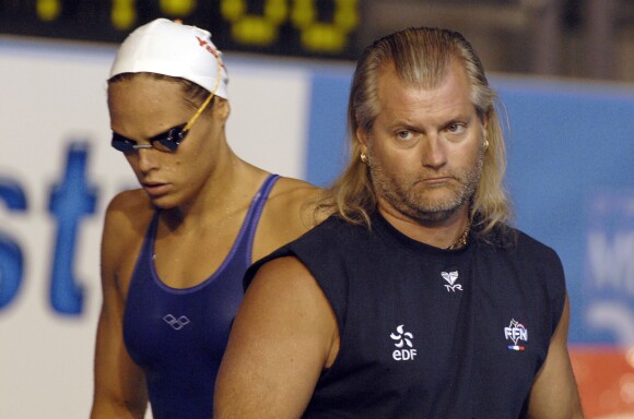Laure Manaudou et Philippe Lucas lors des championnats du monde à la Rod Laver Arena de Melbourne, le 25 mars 2007