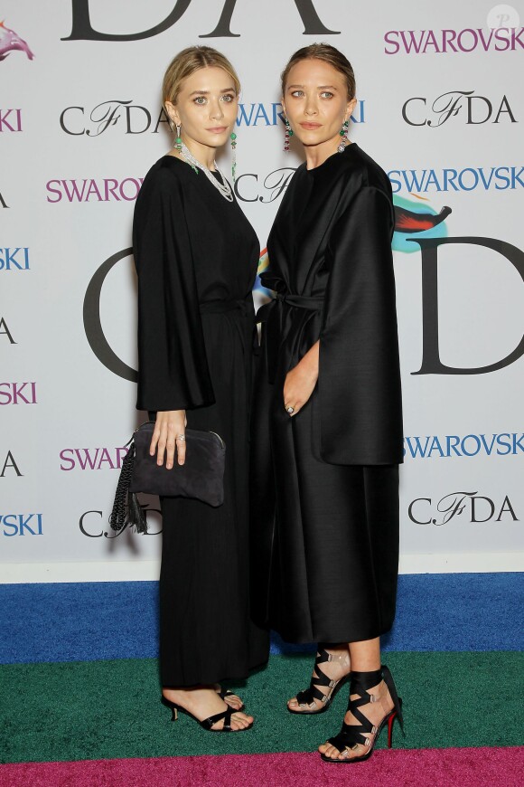 Ashley et Mary-Kate Olsen aux CFDA Fashion Awards 2014 à New York. Juin 2014.
