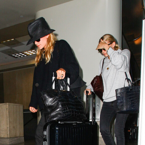Mary-Kate et Ashley Olsen à Los Angeles. Août 2014.