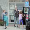 Exclusif - Tori Spelling avec ses enfants Liam et Stella à la sortie d'un salon de massage Thaï à Encino, le 24 mai 2015  For germany call for price - Please hide children face prior publication Exclusif - Tori Spelling takes two of her kids along for her 3-hour Thai massage. Tori, 42, took Liam, 8, and Stella, 6, to her massage appointment in Encino and had them wait in the front. Tori sported a bandage on her right arm from her supposed burn at Benihana on Easter Sunday. The burn had healed enough to get a legnthy massage.24/05/2015 - Encino