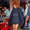 Rihanna quitte le restaurant Da Silvano à New York, habillée d'un pull Vetements et de sandales Stuart Weitzman (modèle Legwrap). New York, le 11 août 2015.