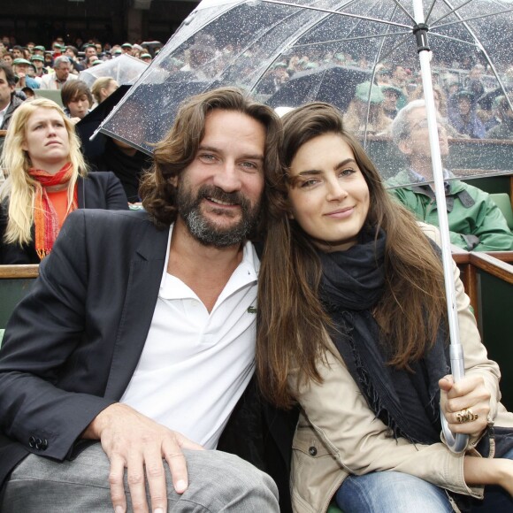 Frédéric Beigbeder et sa compagne Lara lors des internationaux de France de Rolang Garros à Paris, le 10 juin 2012