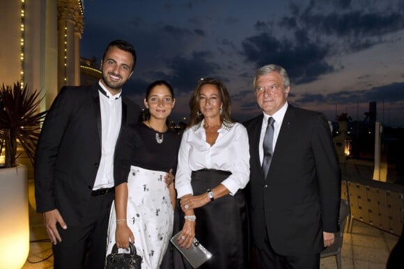 Katia, Sidney Toledano, leur fils Alan et sa compagne Joy Taied assistent au 18e Grand Bal de Deauville, au profit de l'association Care France. Deauville, le 29 août 2015.