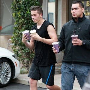 David, Victoria et Brooklyn Beckham à la sortie de leur cours de Soul Cycle à Brentwood, le 20 aout 2015