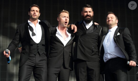 Keith Duffy, Ronan Keating, Shane Lynch et Mikey Graham du groupe Boyzone lors du British Summer Time Festival au Hyde Park à Londres, le 13 juillet 2014.