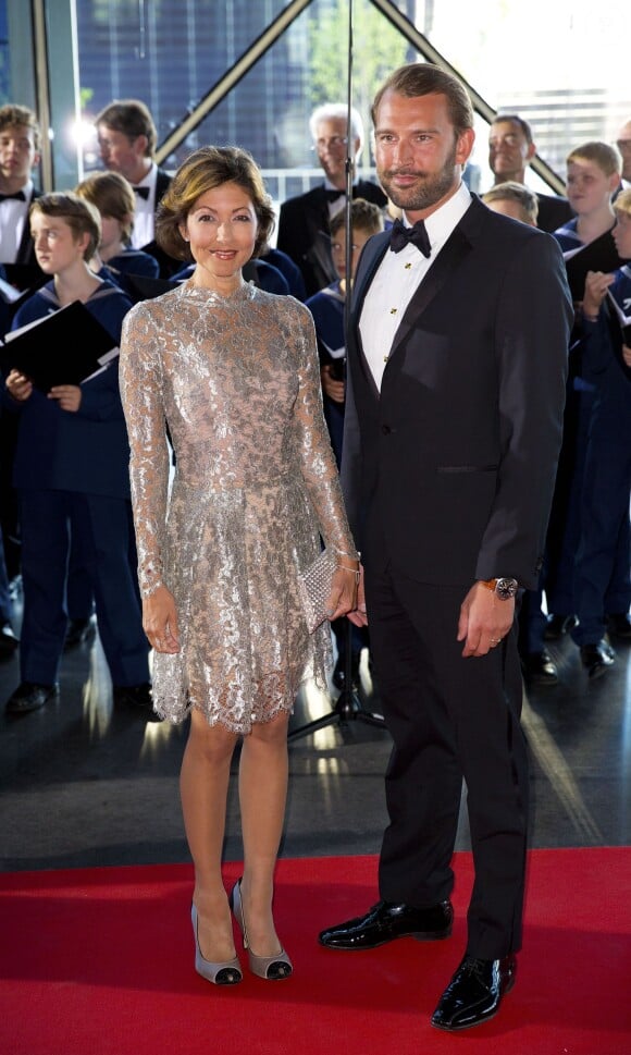 La comtesse Alexandra de Frederiksborg et son mari Martin Jorgensen à un concert à l'occasion des 80 ans du prince Henrik de Danemark à Copenhague le 1er juin 2014. La comtesse, ex-femme du prince Joachim, a annoncé en septembre 2015 leur divorce, après huit ans d'un mariage célébré en mars 2007.