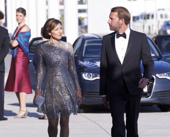 La comtesse Alexandra de Frederiksborg et son mari Martin Jorgensen à un concert à l'occasion des 80 ans du prince Henrik de Danemark à Copenhague le 1er juin 2014. La comtesse, ex-femme du prince Joachim, a annoncé en septembre 2015 leur divorce, après huit ans d'un mariage célébré en mars 2007.
