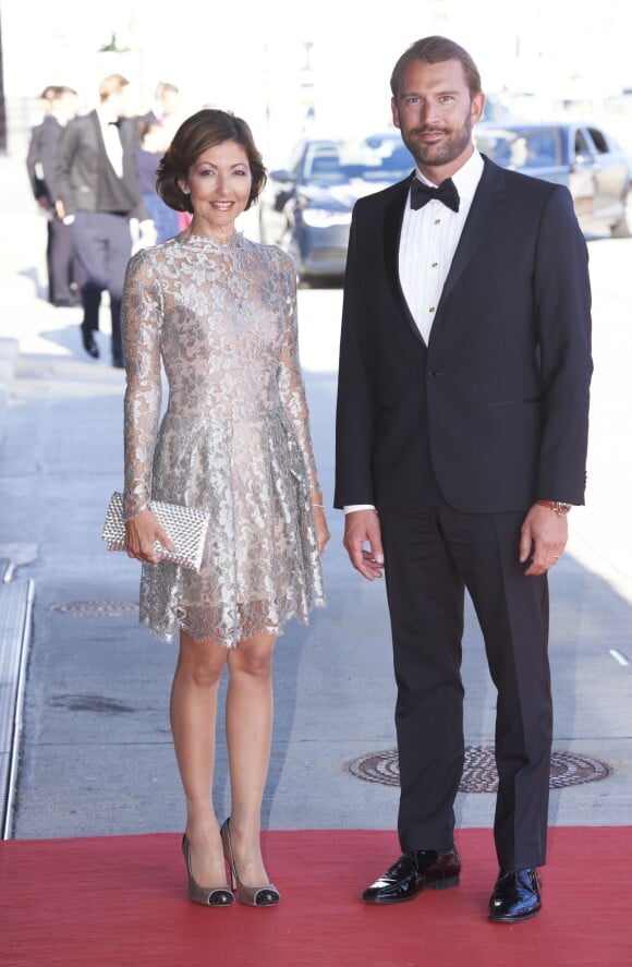 La comtesse Alexandra de Frederiksborg et son mari Martin Jorgensen à un concert à l'occasion des 80 ans du prince Henrik de Danemark à Copenhague le 1er juin 2014. La comtesse, ex-femme du prince Joachim, a annoncé en septembre 2015 leur divorce, après huit ans d'un mariage célébré en mars 2007.