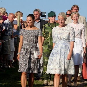 La princesse Victoria de Suède et la princesse Mette-Marit de Norvège lors du pèlerinage du Climat entre Halden (Norvège) et Stromstad (Suède) le 22 août 2015, préfigurant le sommet environnemental COP21.