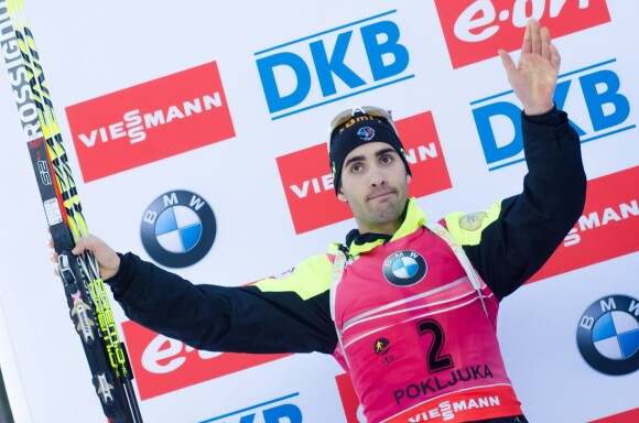 Martin Fourcade sur le podium de l'épreuve de Coupe du monde du 15km Mass Start à Pokljuka, le 21 décembre 2014