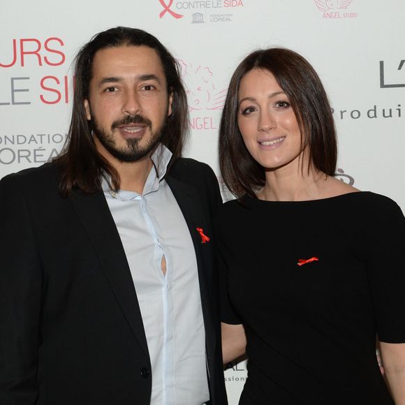 Moundir et sa femme Inès lors de l'opération " Coiffeurs Contre le Sida " édition 2014 à l'Académie L'Oréal Produits Professionnels à Paris, le 1er décembre 2014.