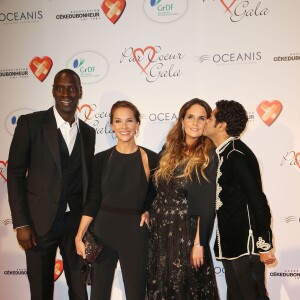 Omar Sy, Mélissa Theuriau, Hélène Sy et Jamel Debbouze au gala "Par Coeur" pour les 10 ans de l'association "Cekedubonheur" au pavillon d'Armenonville à Paris. Le 24 septembre 2015