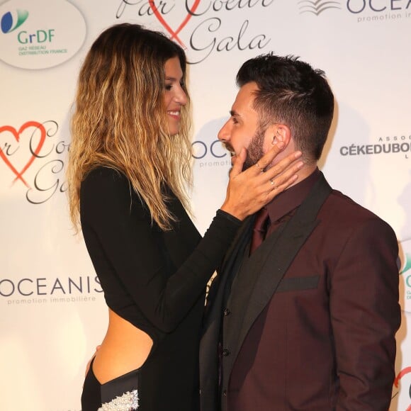 Michaël Youn et sa compagne Isabelle Funaro au gala "Par Coeur" pour les 10 ans de l'association "Cekedubonheur" au pavillon d'Armenonville à Paris. Le 24 septembre 2015