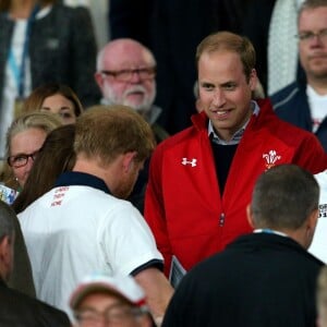 Prince Harry, Prince William, et Catherine Middleton, lors du match Angleterre - Pays de Galles à Twickenham, Londres, le 26 septembre 2015.