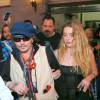 Johnny Depp et sa femme Amber Heard à la sortie du festival Rock in Rio au Brésil, le 24 septembre 2015