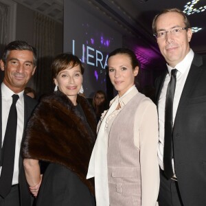 Exclusif - Stéphane Seriset (Vice-President, Global Marketing & Sales at Alès Group - LIERAC/PHYTO ), Kristin Scott Thomas (égérie Premium), Lorie (Laure Pester) et Jean-Paul Pinto (Directeur Général Délégué France chez Alès groupe) - Soirée du fabricant de produits de soins dermo-cosmétiques Lierac à l'occasion du lancement de la nouvelle gamme de soins d'exception Premium, issue de la médecine régénératrice dont Kristin Scott Thomas est l'égérie dans les salons de l'hôtel Peninsula à Paris le 1er octobre 2015.
