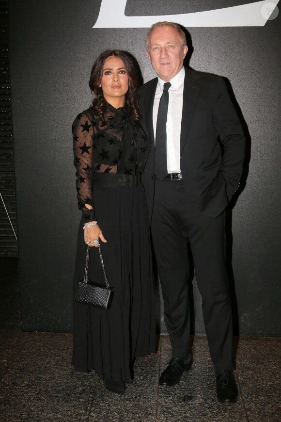 Salma Hayek et son mari François-Henri Pinault - People au défilé de mode "Saint Laurent", collection prêt-à-porter printemps-été 2016, à Carreau du Temple à Paris. Le 5 Octobre 2015
