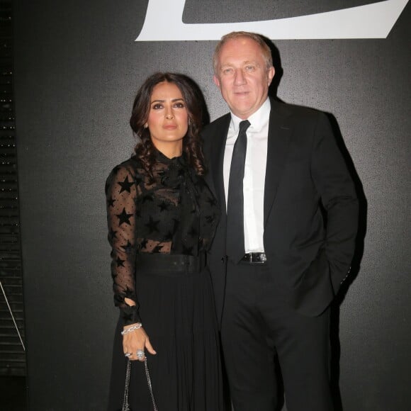 Salma Hayek et son mari François-Henri Pinault - People au défilé de mode "Saint Laurent", collection prêt-à-porter printemps-été 2016, à Carreau du Temple à Paris. Le 5 Octobre 2015