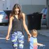 Please hide the child's face prior to the publication - Supermodel beauty Alessandra Ambrosio drops her son off at school in Brentwood, Los Angeles, CA, USA on October 13, 2015. She is wearing Bandier leggings and espadrilles. Photo by GSI/ABACAPRESS.COM14/10/2015 - Los Angeles