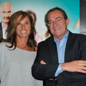 Jean-Pierre Pernaut et sa femme Nathalie Marquay, à la Comédie Caumartin à Paris, le 6 octobre 2014.