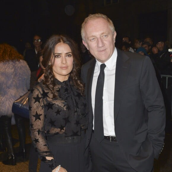 François-Henri Pinault et sa femme Salma Hayek - People au défilé Saint Laurent prêt-à-porter collection Printemps/Eté 2016 lors de la fashion week à Paris, le 5 octobre 2015.