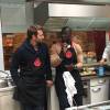 Bradley Cooper et Omar Sy chez L'Atelier du Chef à Paris le 25 octobre 2015.