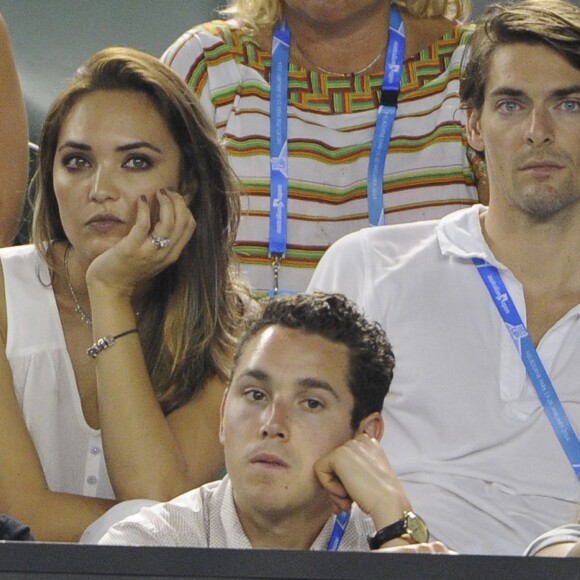 Camille Lacourt et Valérie Bègue assistent à l'Open d'Australie, le 16 janvier 2014 au Melbourne Park de Melbourne