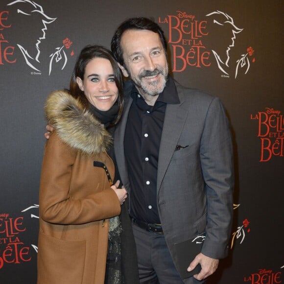 Jean-Hugues Anglade et sa compagne Charlotte Leloup à la générale de la comedie musicale "La Belle et la Bête" au Théatre Mogador à Paris le 24 octobre 2013.