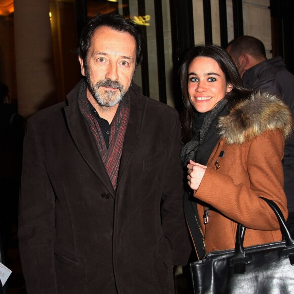 Jean-Hugues Anglade et sa compagne Charlotte Leloup à la générale de la comedie musicale "La Belle et la Bête" au Théatre Mogador à Paris le 24 octobre 2013.
