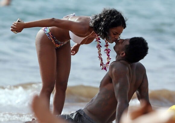 Exclusif - Teyana Taylor et son compagnon, le joueur de NBA Iman Shumpert passent la journée sur la plage à Maui, Hawaï, le 25 juin 2014.