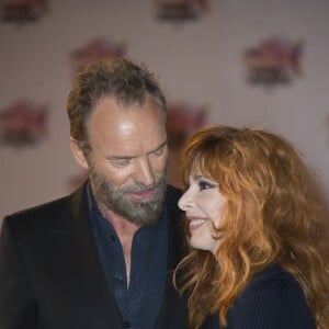 Sting et Mylène Farmer sur le tapis rouge des NRJ Music Awards au Palais des Festivals à Cannes, le 7 novembre 2015 © Christophe Aubert