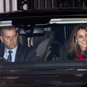 Kate Middleton, le prince Harry et le prince George participaient au déjeuner de Noël à Buckingham Palace à Londres, le 16 décembre 2015.