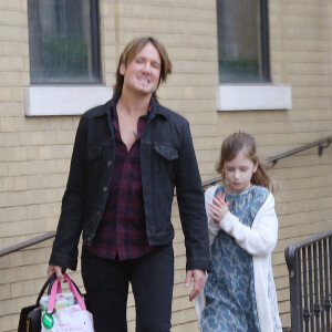 Exclusif - Keith Urban avec Sunday Rose à la sortie d'une église de Nashville le 29 novembre 2015.