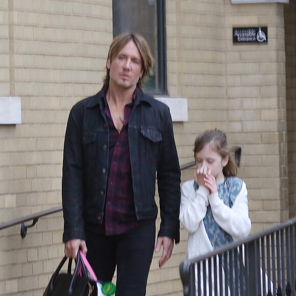 Exclusif - Keith Urban avec Sunday Rose à la sortie d'une église de Nashville le 29 novembre 2015.