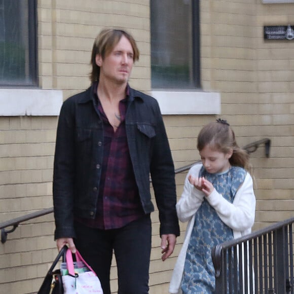 Exclusif - Keith Urban avec Sunday Rose à la sortie d'une église de Nashville le 29 novembre 2015.