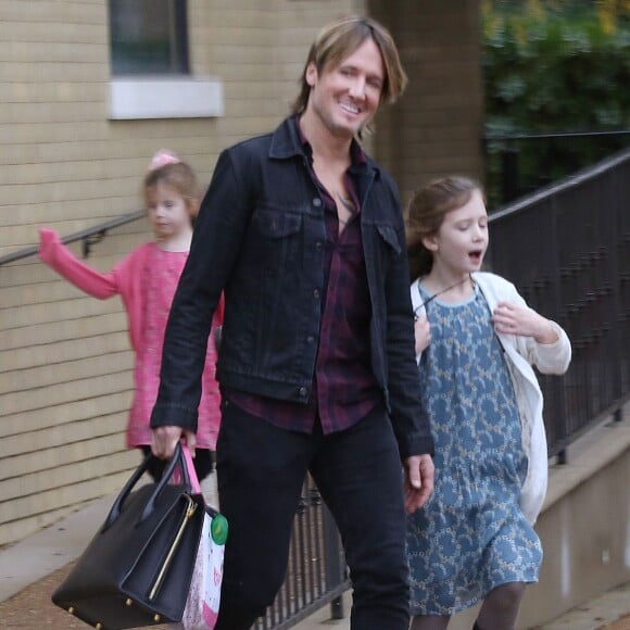 Exclusif - Keith Urban, sa femme Nicole Kidman et leurs filles Sunday et Faith quittent une église de Nashville le 29 novembre 2015.