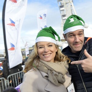 Valérie Trierweiler et Marc-Emmanuel Dufour, animateur de l'émission "Tous ensemble" - Le Secours populaire, Marcel Campion et le Monde Festif invitent 1000 enfants d'Ile de France à la Grande roue place de la Concorde à Paris le 22 décembre 2015 pour une après-midi festive avec remise de cadeaux.