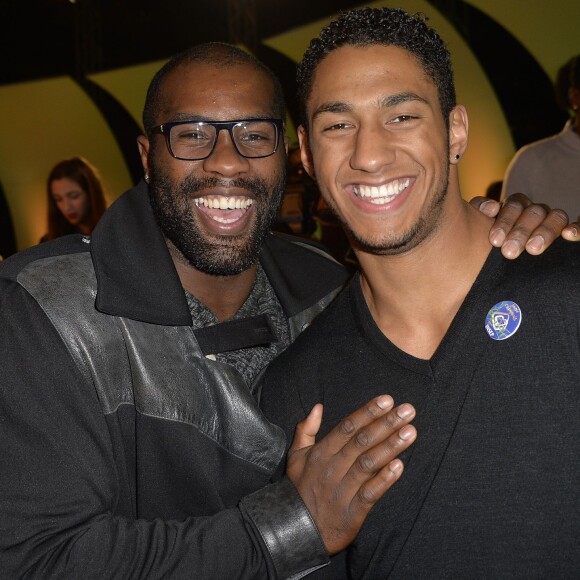 Teddy Riner et Tony Yoka - Soirée de remise des Trophées aux médaillés mondiaux de 2015 à l'occasion des 70 ans de l'INSEP, en présence des grands noms du sport français à la Halle Maigrot de l'INSEP à Paris, le 9 décembre 2015. © Veeren/Bestimage
