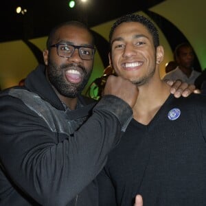 Teddy Riner et Tony Yoka - Soirée de remise des Trophées aux médaillés mondiaux de 2015 à l'occasion des 70 ans de l'INSEP, en présence des grands noms du sport français à la Halle Maigrot de l'INSEP à Paris, le 9 décembre 2015. © Veeren/Bestimage