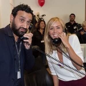 Cyril Hanouna et Enora Malagré - 11ème édition du "BGC Charity Day" à Paris le 11 septembre 2015 en mémoire aux 658 collaborateurs du groupe BGC partners (leader mondial du courtage interbancaire) disparus il y a 14 ans dans les attentats du World Trade Center le 11 septembre 2001.